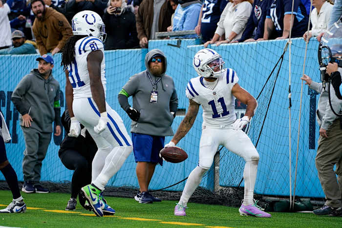 Indianapolis Colts wide receiver Michael Pittman Jr. (11) scores the game winning touchdown against the Tennessee Titans in overtime at Nissan Stadium in Nashville, Tenn., Sunday, Dec. 3, 2023.  